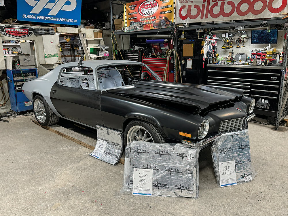 001 Partially restored Camaro in a garage, with Flatline insulation sheets prepared for installation copy-1