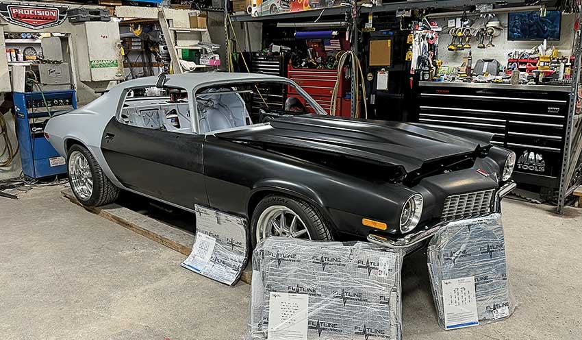 001-Partially-restored-Camaro-in-a-garage,-with-Flatline-insulation-sheets-prepared-for-installation