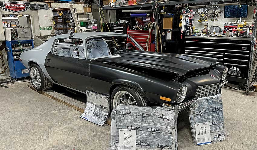 001-Partially-restored-Camaro-in-a-garage-with-Flatline-insulation-sheets-prepared-for-installation-copy