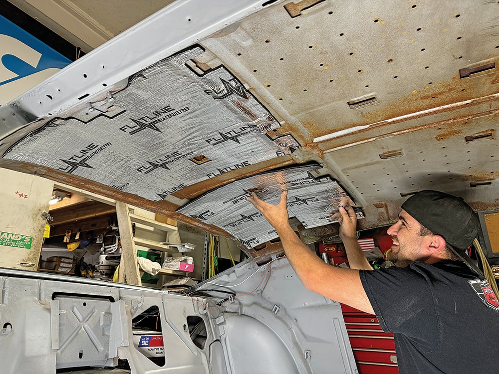 027 Installing insulation on the Camaro’s roof for noise reduction copy