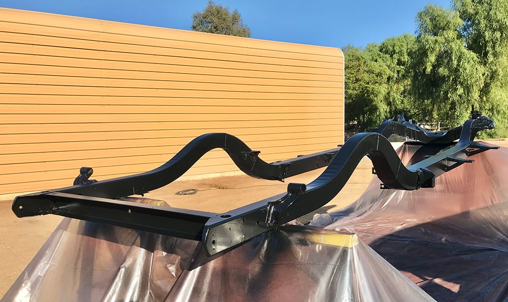 1955 Chevy chassis in paint beauty shot