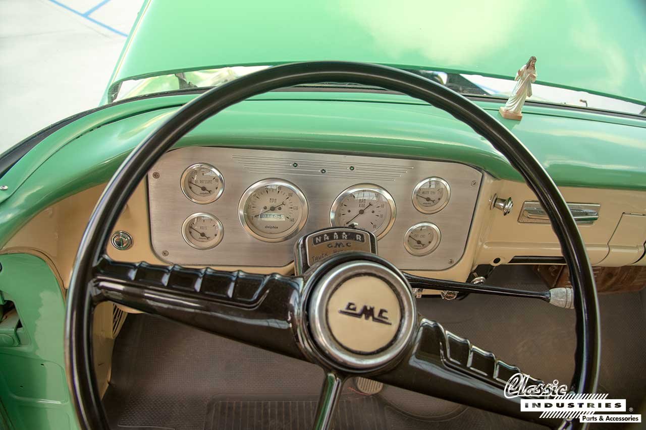 1955_GMC_100_Series_Sage_Green_Dash_and_Steering_Wheel_and_Jesus