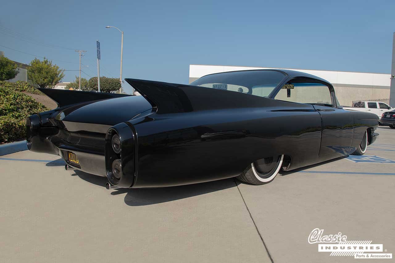 60-Cadillac_Black_Three_Fourth_Rear