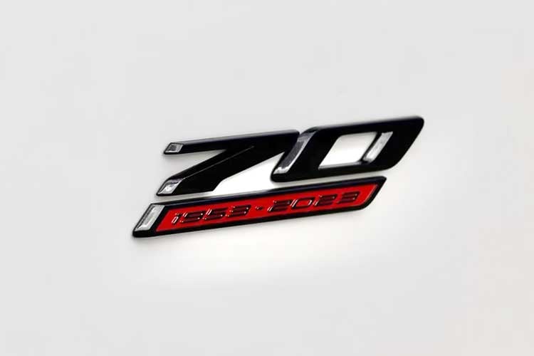 corvette-generations-history-design-development-2023-corvette-z06-70th-anniversary-emblem