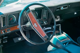 The car's interior has been meticulously restored to original form—factory A/C and all.